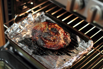 Baked pork butt on a tray.