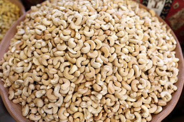 Plate of cashew nuts on counter