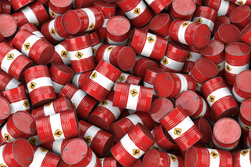 Red oil barrels. Oil and gas industry, storage, manufacturing. Chemical pollution and oil industry waste concept.