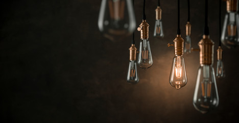 Individuality concept, one bright light bulb standing out from the crowd with copy space - Powered by Adobe