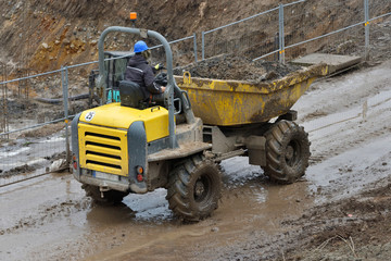 Dump truck hauling ground