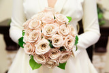 Bride holding her bouquet, closeup