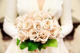 Bride holding her bouquet, closeup
