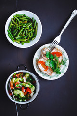 selection of healthy food on a black background, top view. copy space.