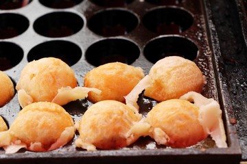 Takoyaki is delicious Japanese food on pan