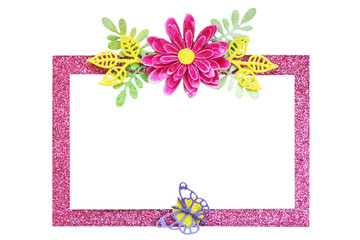 a pink shiny rectangular frame with a handmade paper flower and leaves and a purple butterfly on a shiny yellow flower. isolate on white background. copy space..
