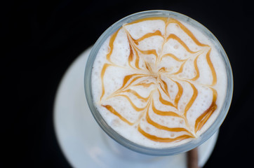 cup of coffee on a black background