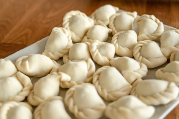 Plates with Carinthian noodles (Kärntner Nudeln) - ready for cooking