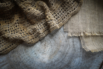 Background from cross section of tree trunk and natural linen napkins