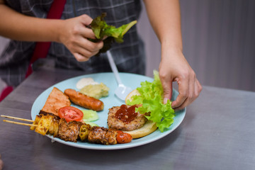 burger with french fries and salad