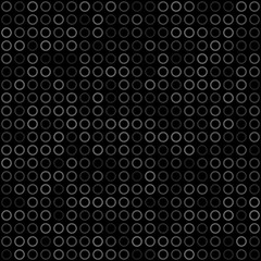 Fototapeta na wymiar Abstract seamless pattern of small rings or pixels in gray and black colors