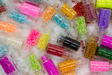 glass flasks with colored beads