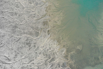 Obraz premium Aerial view of degraded landscape. Destroyed land. View from above. Industrial place. Photo captured with drone.