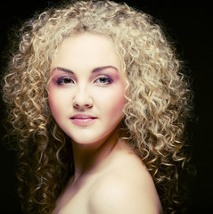 blonde with curly hair 