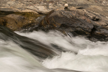 water flowing over rocks