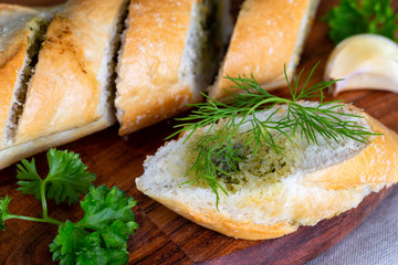 Fresh herb baguette with dill, parsley and garlic