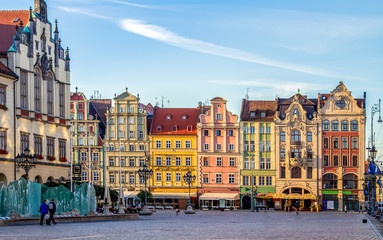 Wroclaw, Poland. Market square with it's famous fountain and colorful historical houses early in the morning.