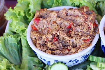 Pickled fish chili spicy with fresh vegetables