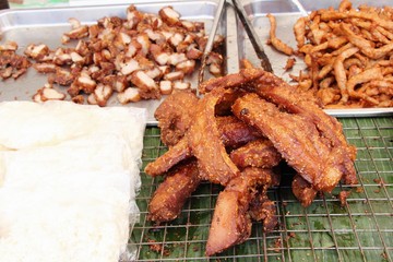 Fried pork with garlic in street food