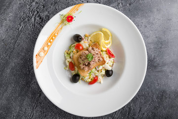 fresh healthy tuna salad appetizer on white plate