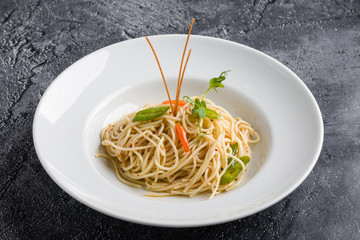 fresh spaghetti olio peperoncini pasta in white plate