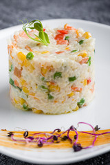 cooked tasty rice portion on white plate