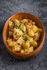 fresh healthy baked delicious baked potato on white plate