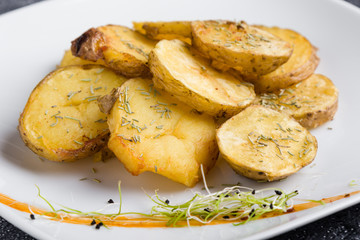fresh healthy baked delicious baked potato on white plate