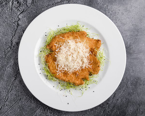 tasty delicious fried chicken schnitzel in restaurant setting