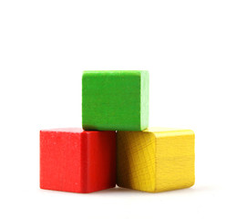 Studio Shot Of Colorful Toy Blocks Against White Background