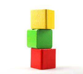 Studio Shot Of Colorful Toy Blocks Against White Background