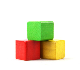 Studio Shot Of Colorful Toy Blocks Against White Background