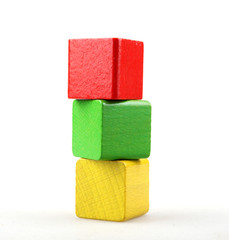 Studio Shot Of Colorful Toy Blocks Against White Background