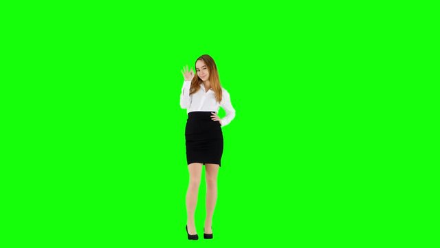 Office Female Waving and Sending Kiss on Green Screen