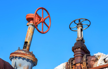 Old rusty pipeline with valves