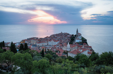 Panoramic view of the old town of Piran at the sunset, from the medieval old town walls