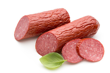Salami smoked sausage, basil leaves on white background cutout.