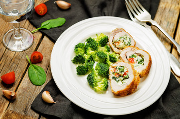 Ricotta tomato spinach stuffed turkey with broccoli