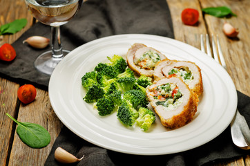 Ricotta tomato spinach stuffed turkey with broccoli