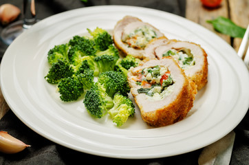 Ricotta tomato spinach stuffed turkey with broccoli