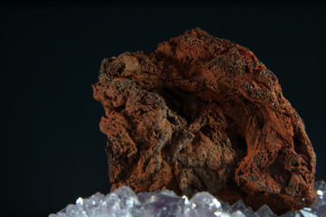 Lava stone in the studio in front of black background photographed in Marco mode 