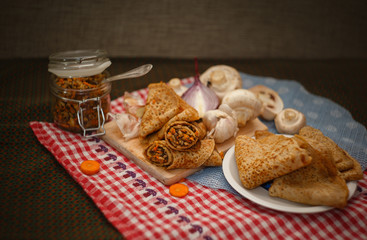 rosy pancakes with mushrooms