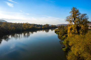 Fototapeta na wymiar Autumn landscape on the river