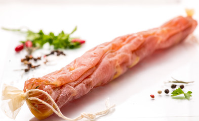 .jerked sausage on a white background