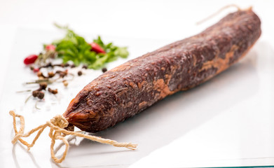 .jerked sausage on a white background