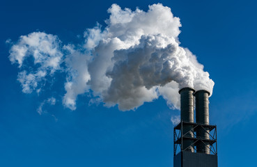 Chimney and Smoke of the Kohlekraftwerk Moorburg Power Plant in Hamburg, Germany.