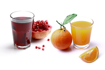 Glass of orange juice and pomegranate juice isolated on white background