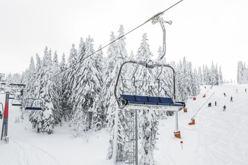 Ski chairlift on mountain in the winter