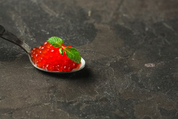 red caviar (canape or sandwich with red snack) salmon fish, seafood. food background. top view