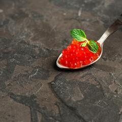 red caviar (canape or sandwich with red snack) salmon fish, seafood. food background. top view